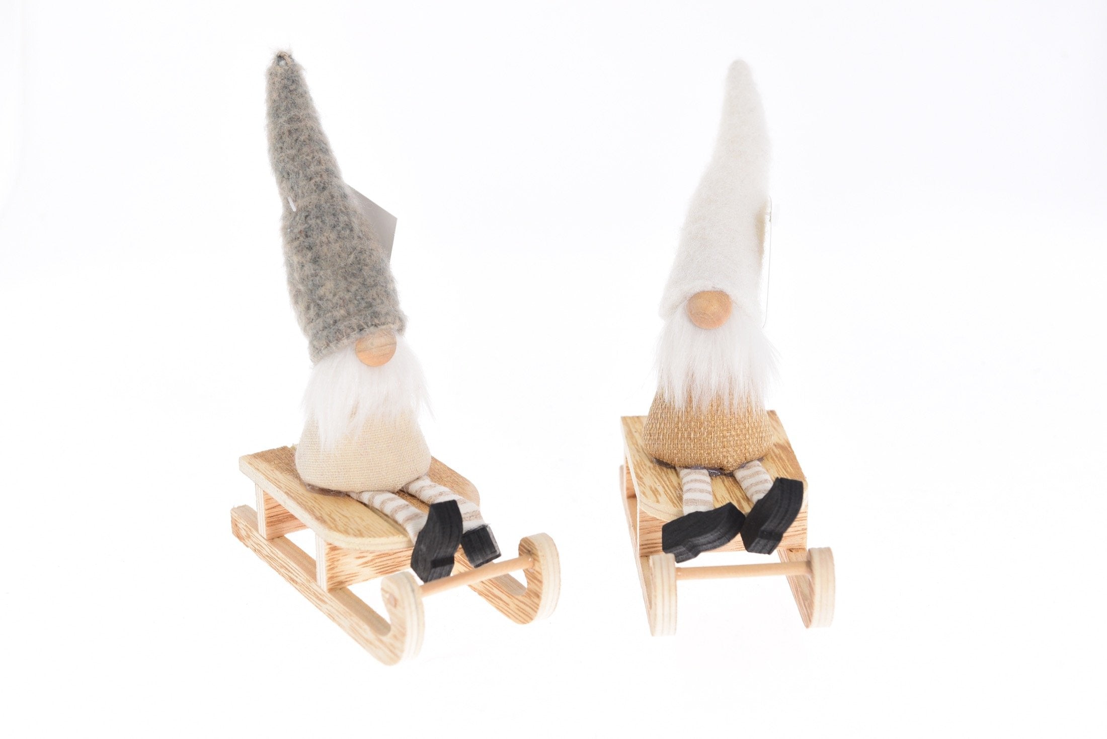 Gnomo sulla slitta con decorazioni