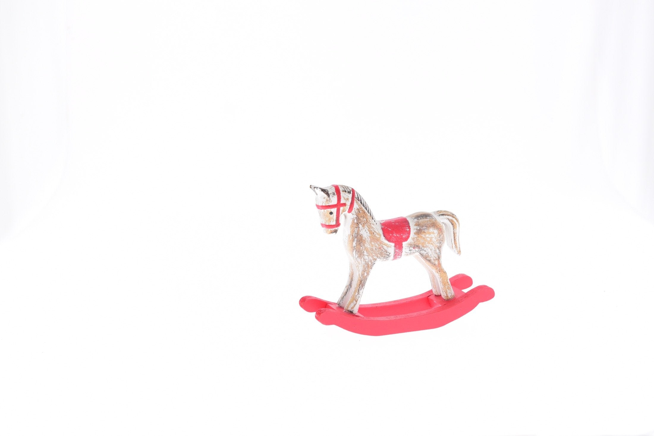 Cavallo a dondolo in legno